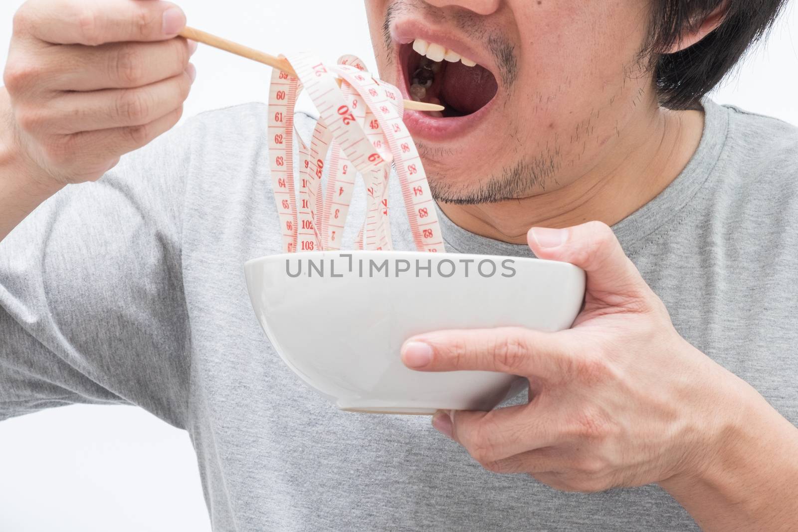 Asian man eating waist measure by zneb076