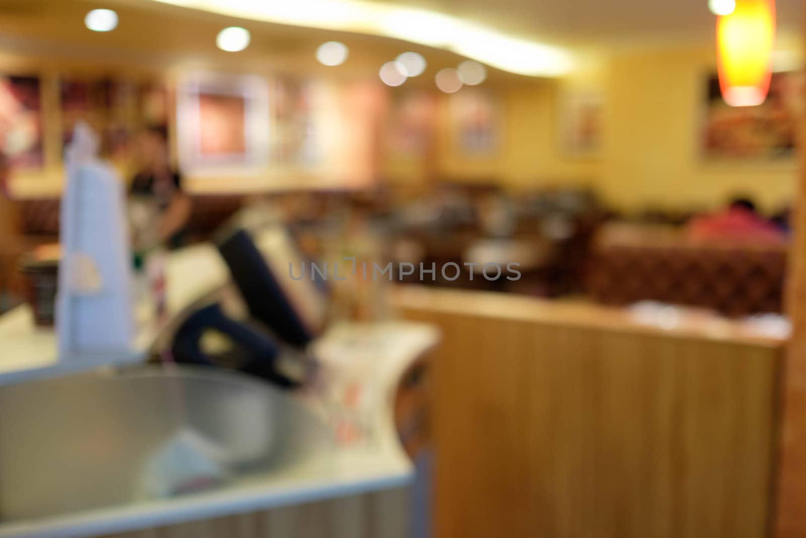 blurred pizza shop cashier use for background by zneb076