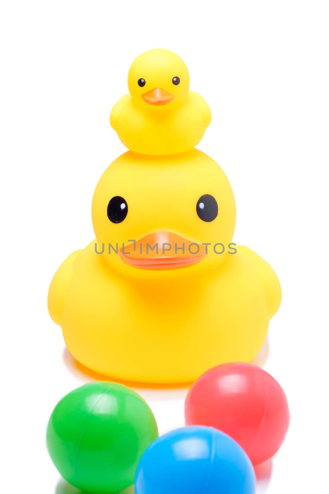 yellow rubber duck with colorful ball by zneb076