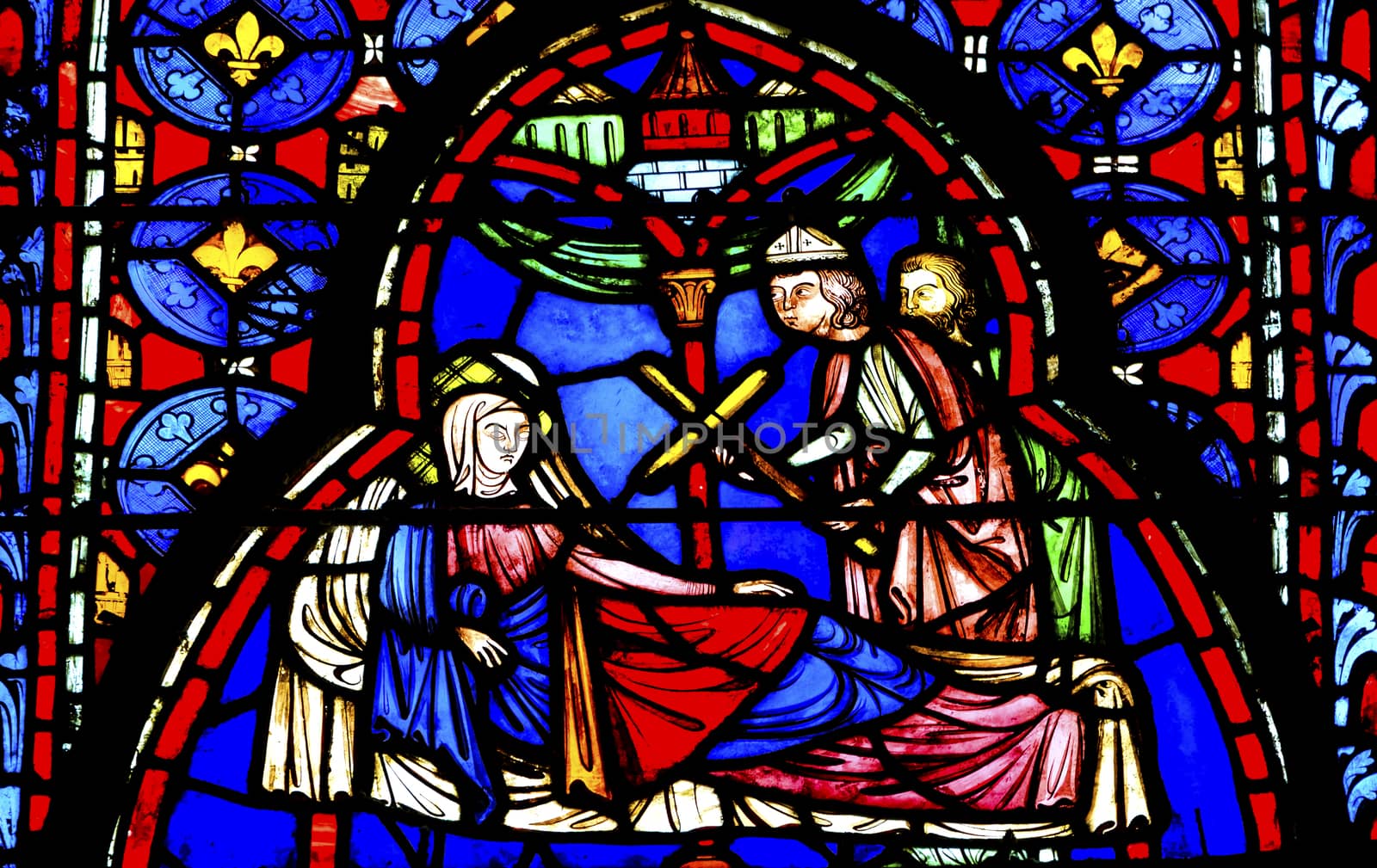 Queen Entering Jerusalem Medieval Life Stained Glass Saint Chapelle Paris France.  Saint King Louis 9th created Sainte Chapelle in 1248 to house Christian relics, including Christ's Crown of Thorns.  Stained Glass created in the 13th Century and shows various biblical stories along with stories from 1200s.