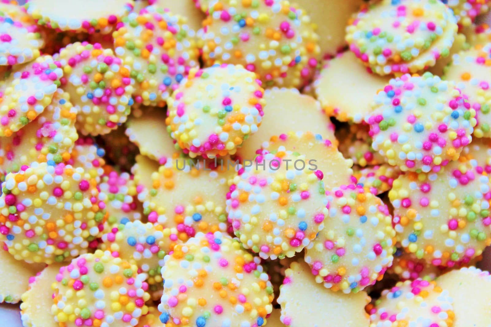 white chocolate buttons with sprinkles by cheekylorns