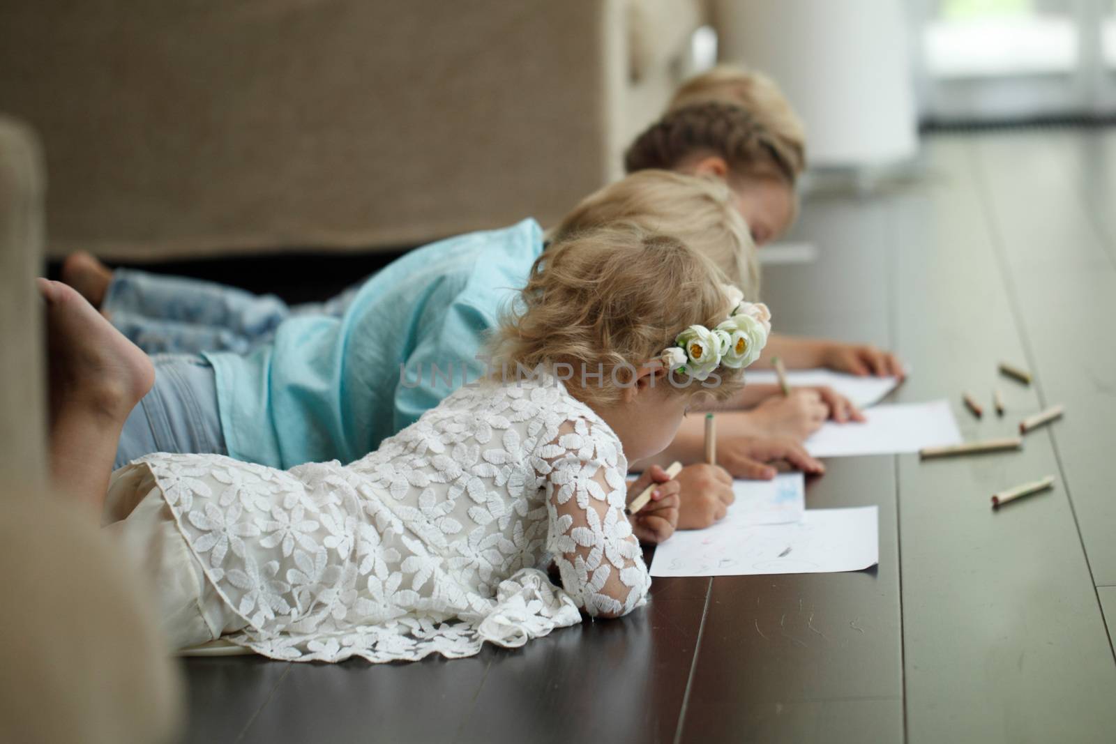 kids drawing pictures at home