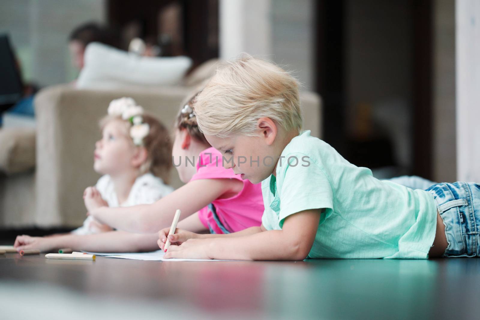 kids drawing pictures at home