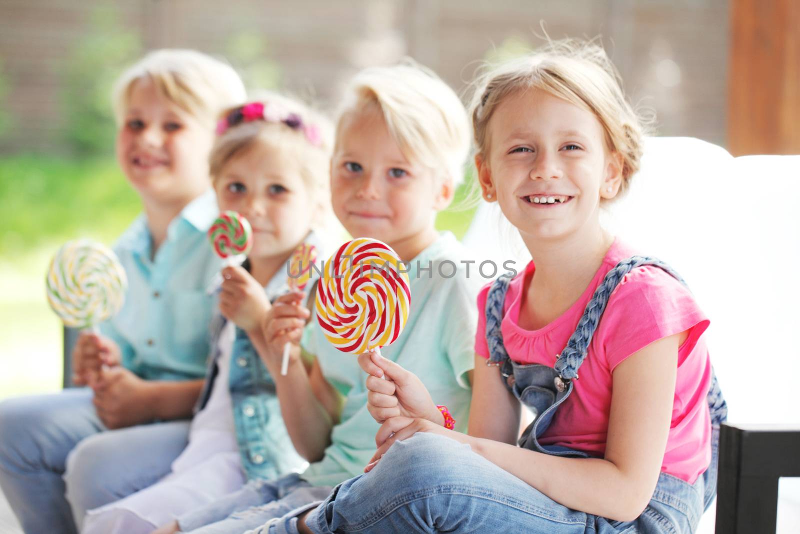 kids with lollipops by ALotOfPeople