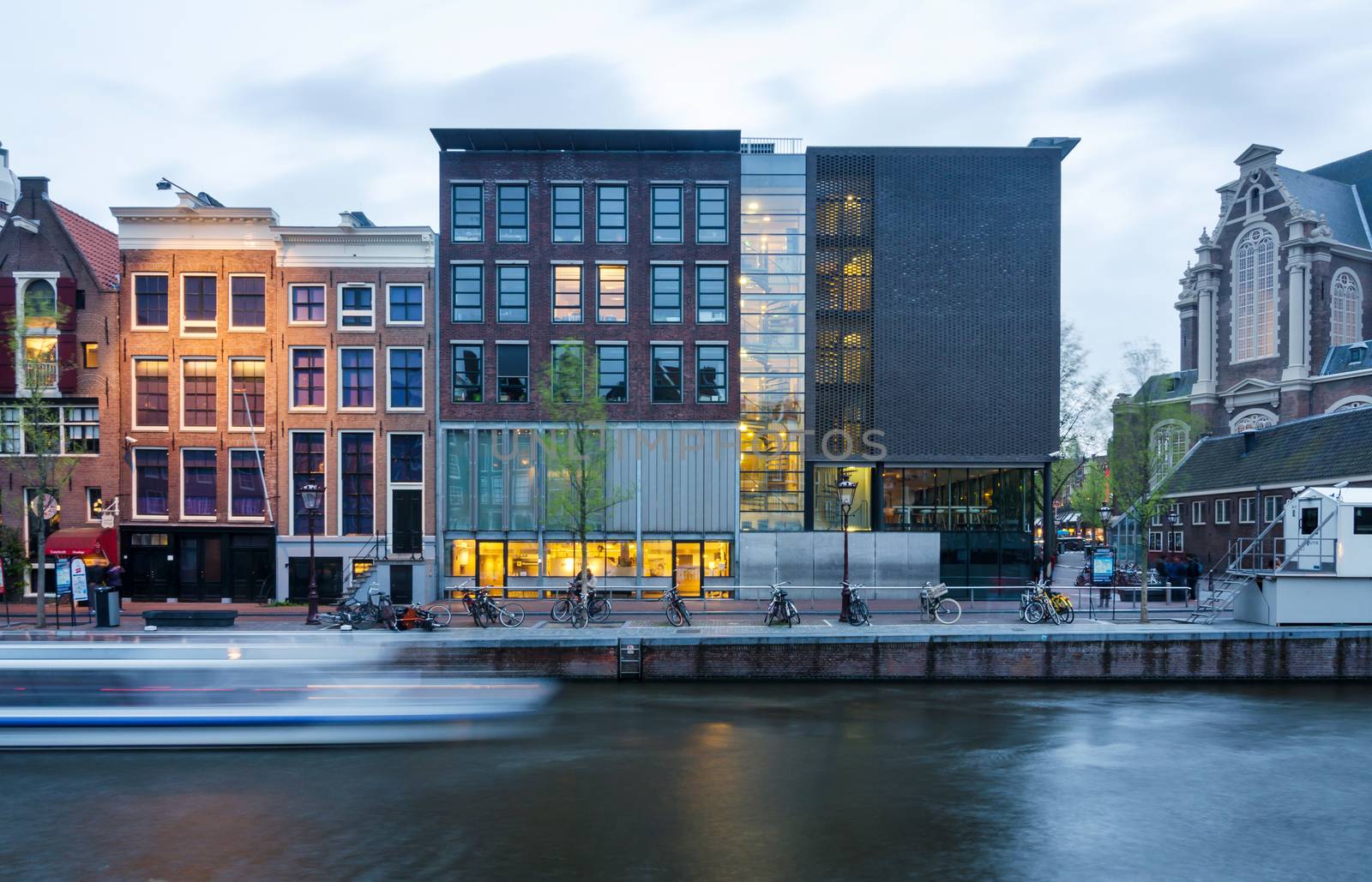 Amsterdam, Netherlands - May 7, 2015: Tourist visit Anne Frank house and holocaust museum in Amsterdam, the Netherlands, on May 7, 2015. Anne Frank house is a popular tourist destination