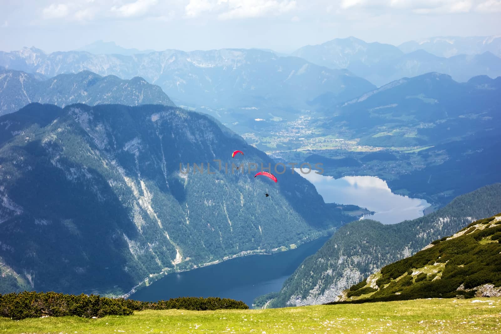 Paraglider at the sky over the Dachstein mountains