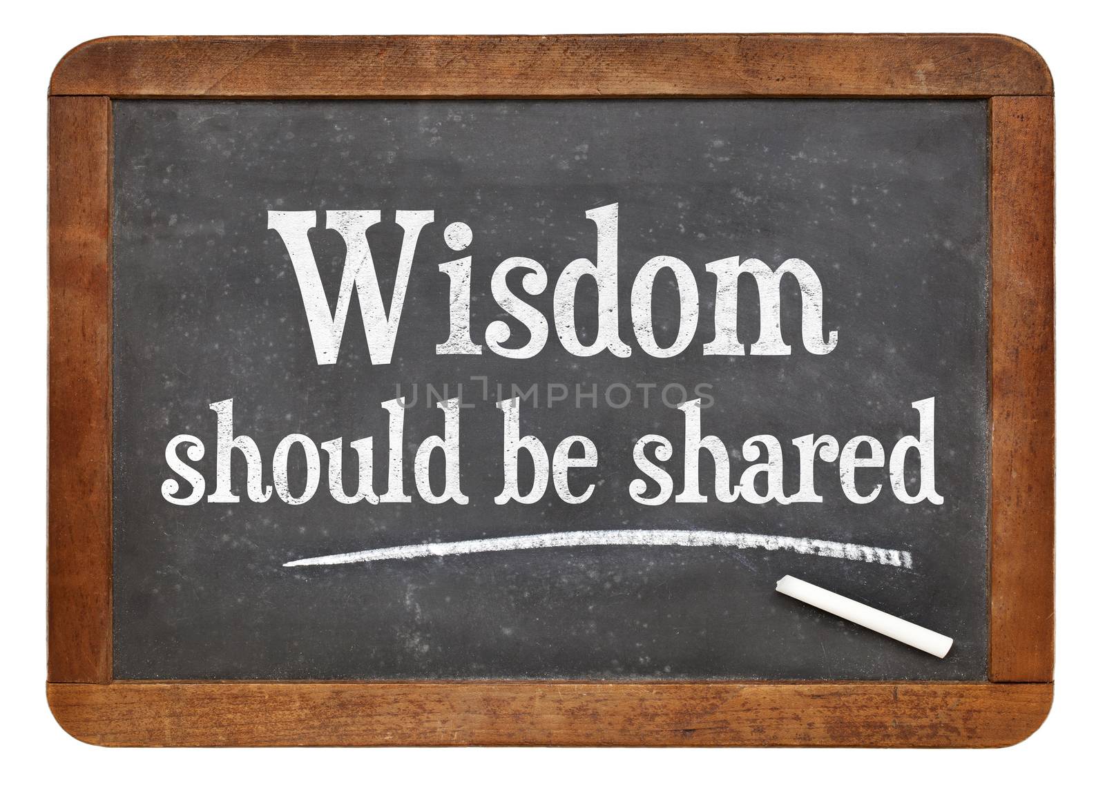 Wisdom should be share - inspirational text in white chalk on a vintage slate blackboard