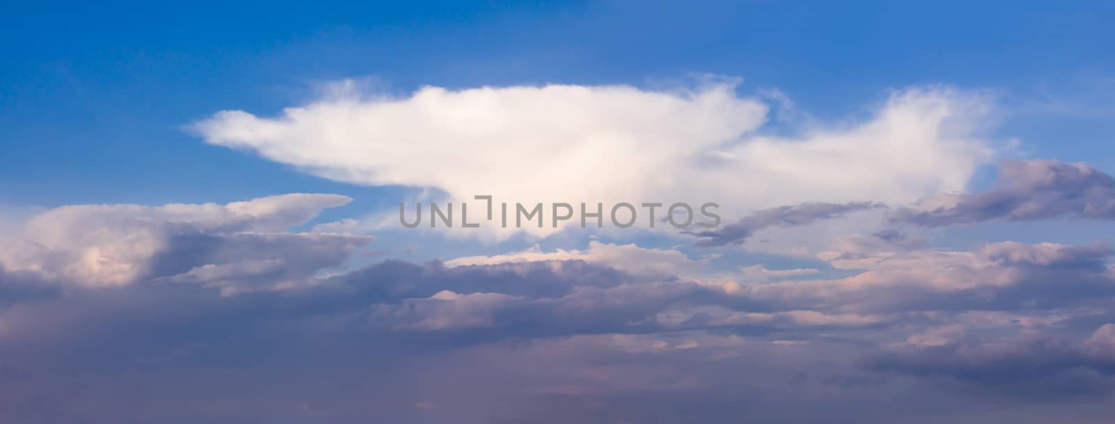 Panorama White clouds close up in blue sky by stoonn