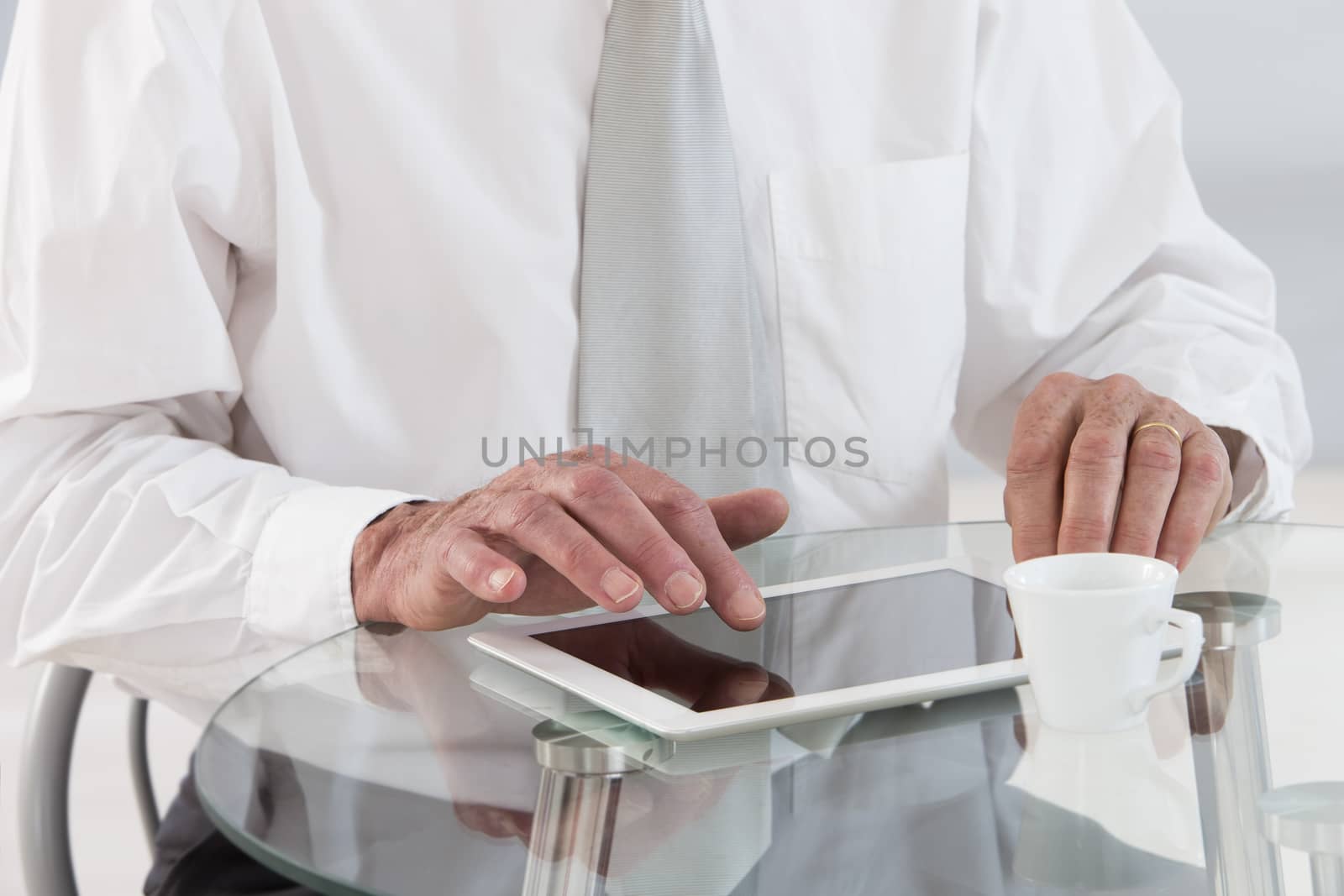 close-up picture of a business man using digital tablet