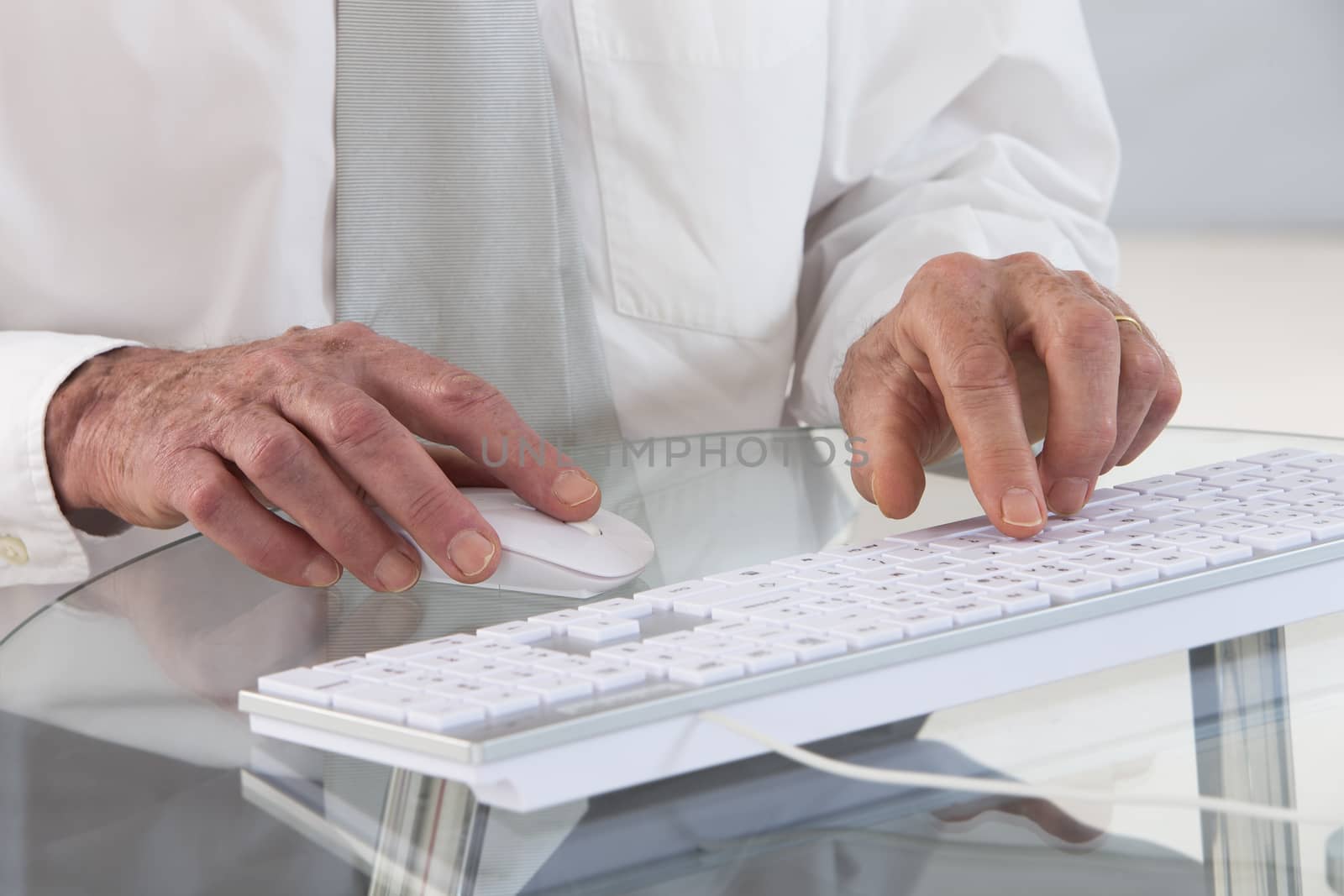 close-up picture of a business man using computer keyboard in hi by JPC-PROD