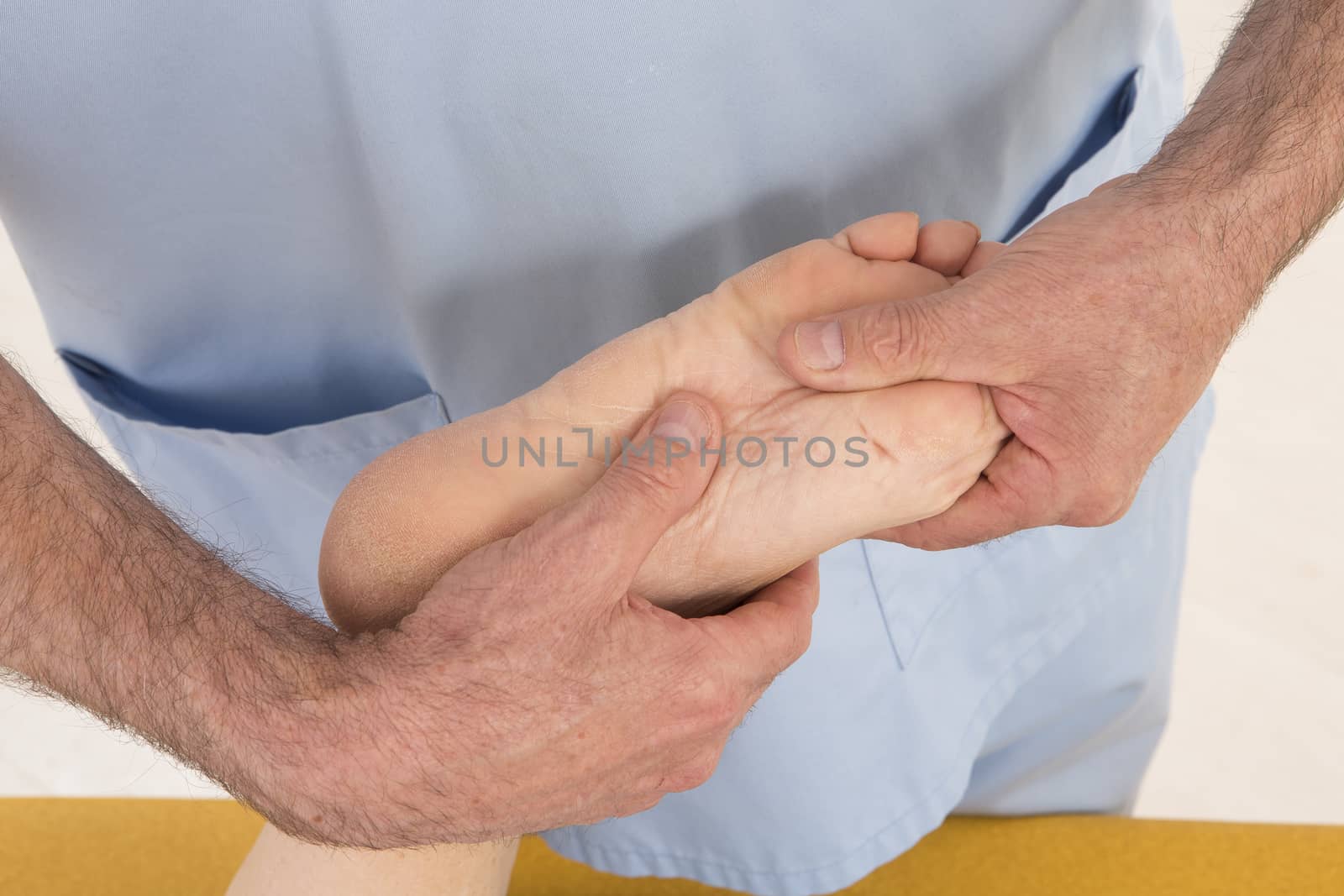 Senior woman having a Foot massage