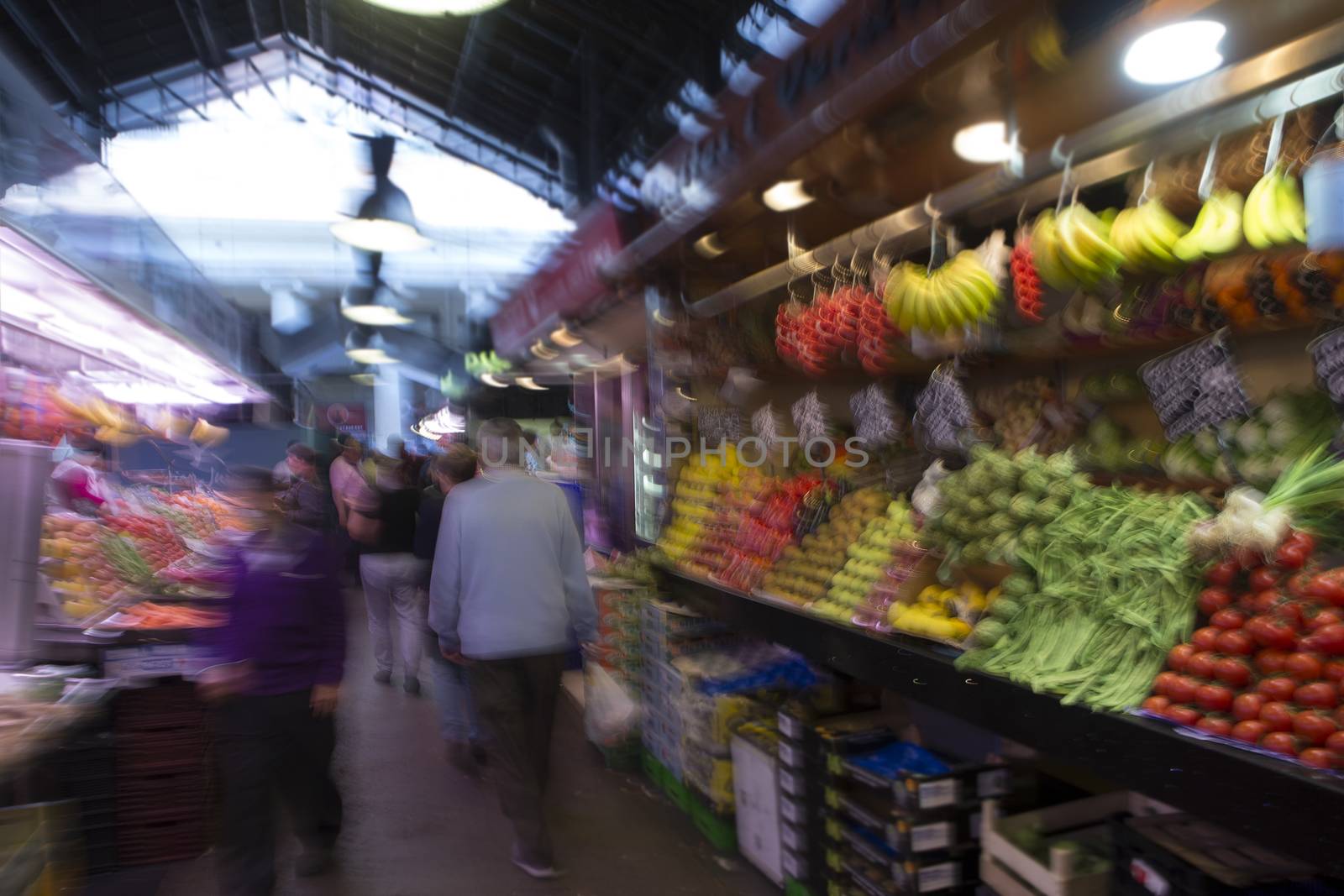 blurry image of fruit and vegetables  in the market