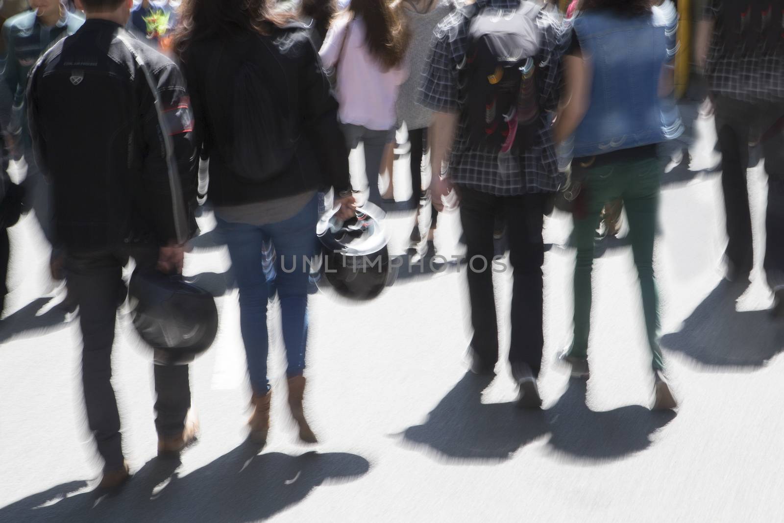 Mlotion blured pedestrians on city street by JPC-PROD