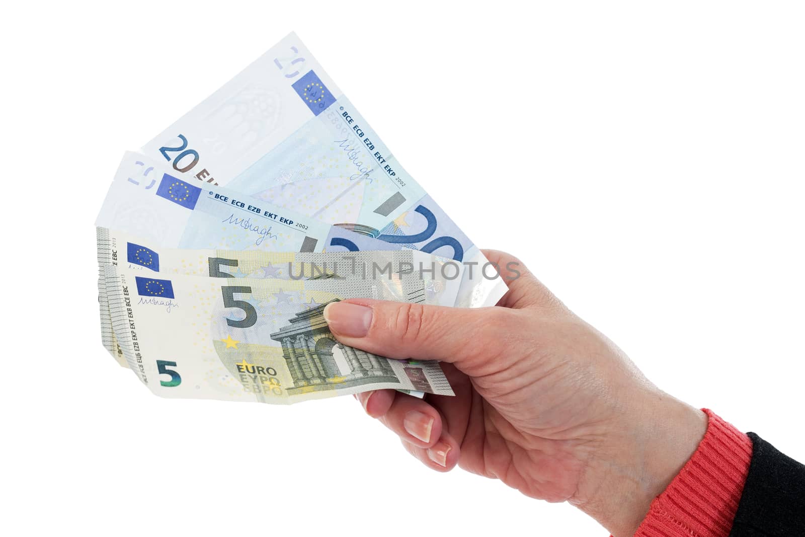Caucasian hand holding a wad of euros for payment, isolated on white