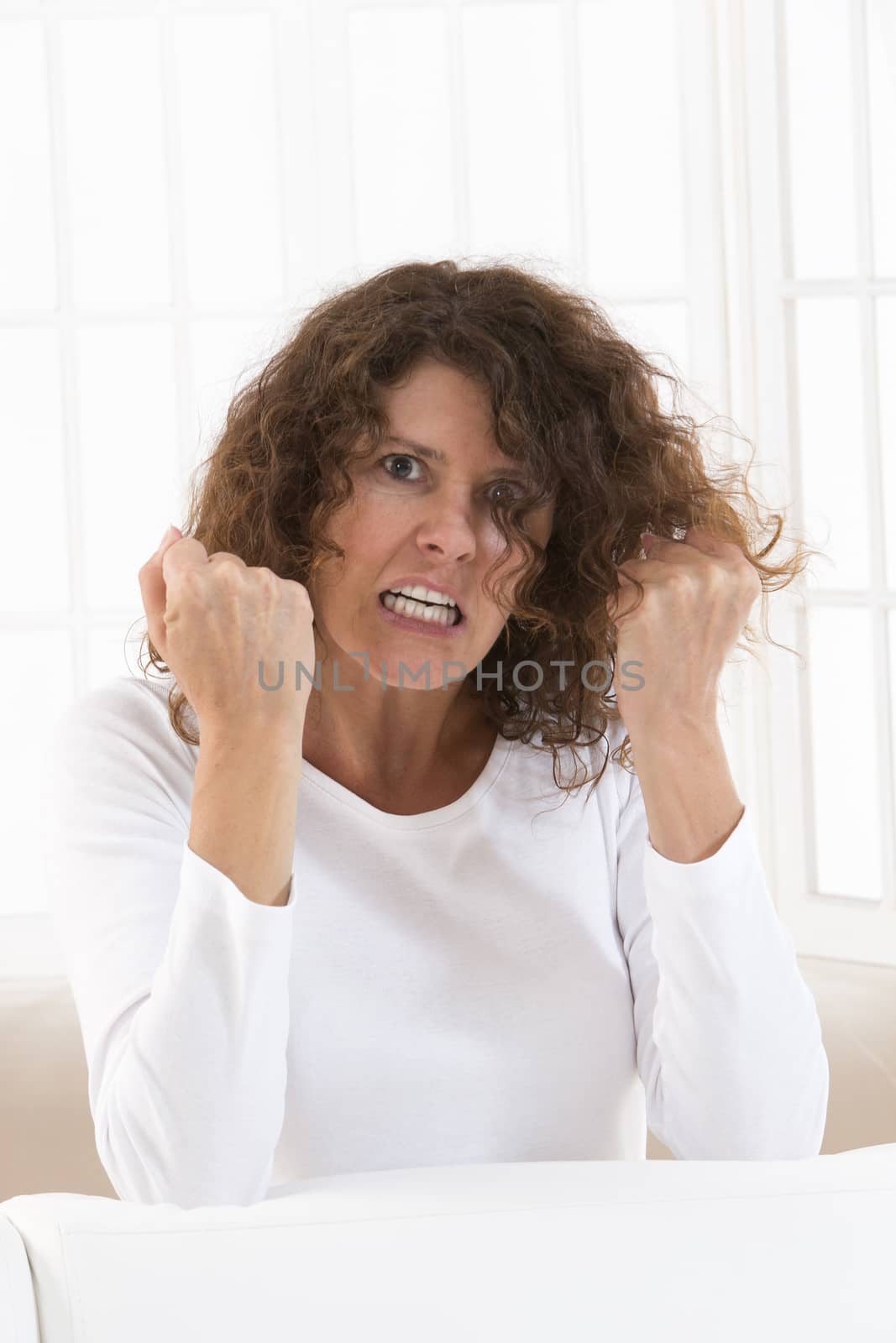 Angry    Stressed woman  showing fists