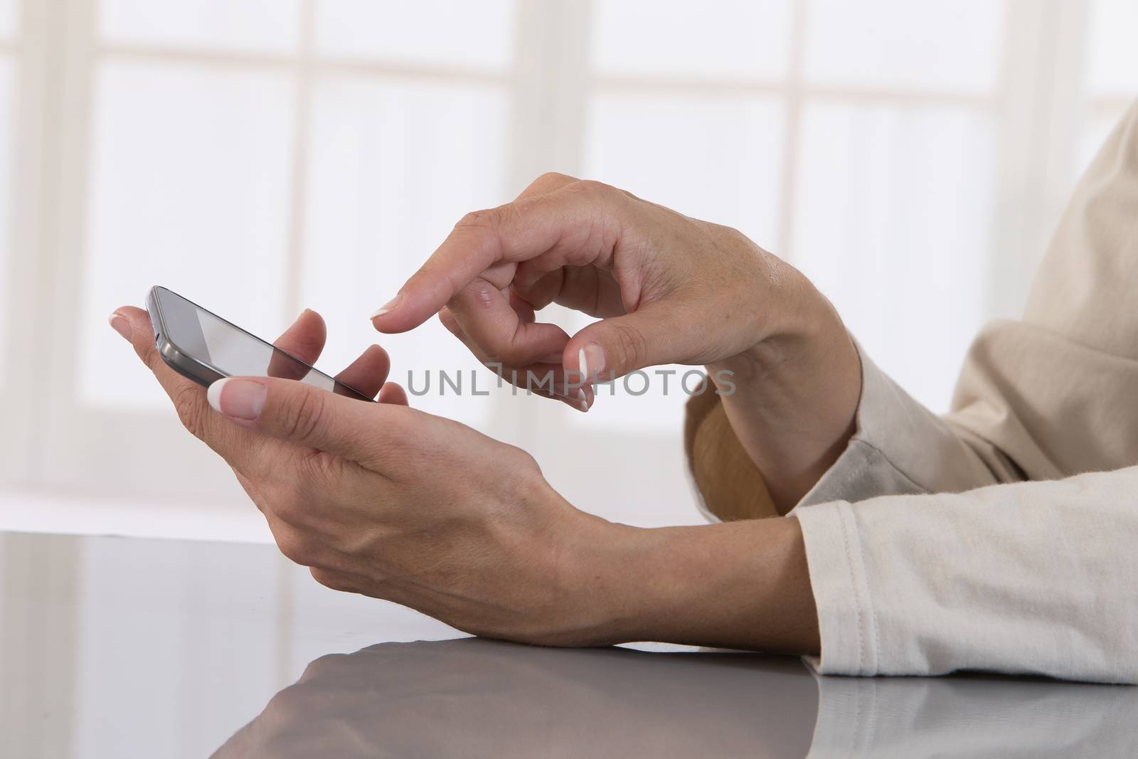 close up of female hand with pen, notebook and smart phone by JPC-PROD