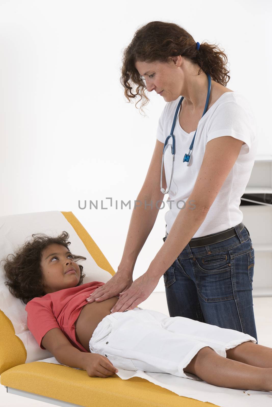 Image of pediatrician doing abdominal examination