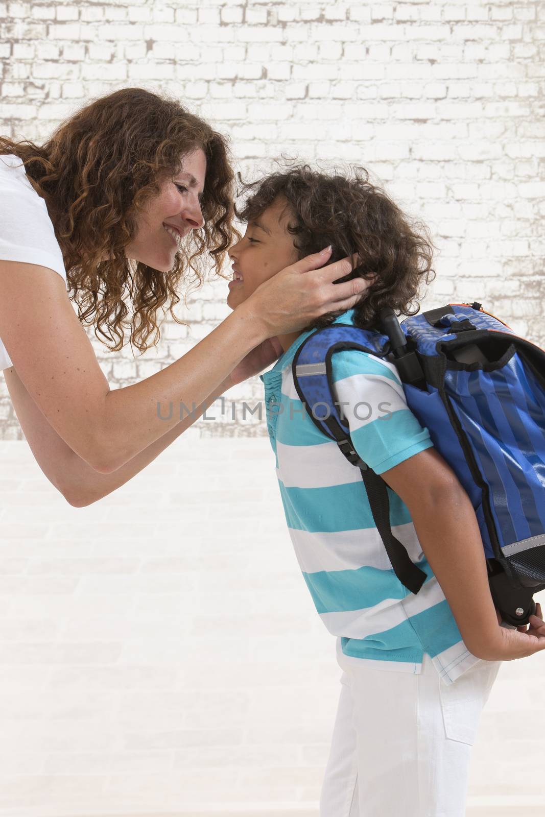  Child  saying mother good-bye before going to shool by JPC-PROD