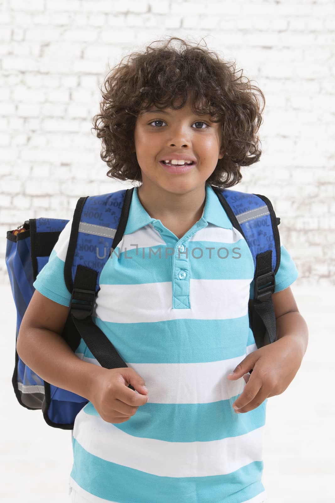 adorable  school boy standing with back school bag by JPC-PROD