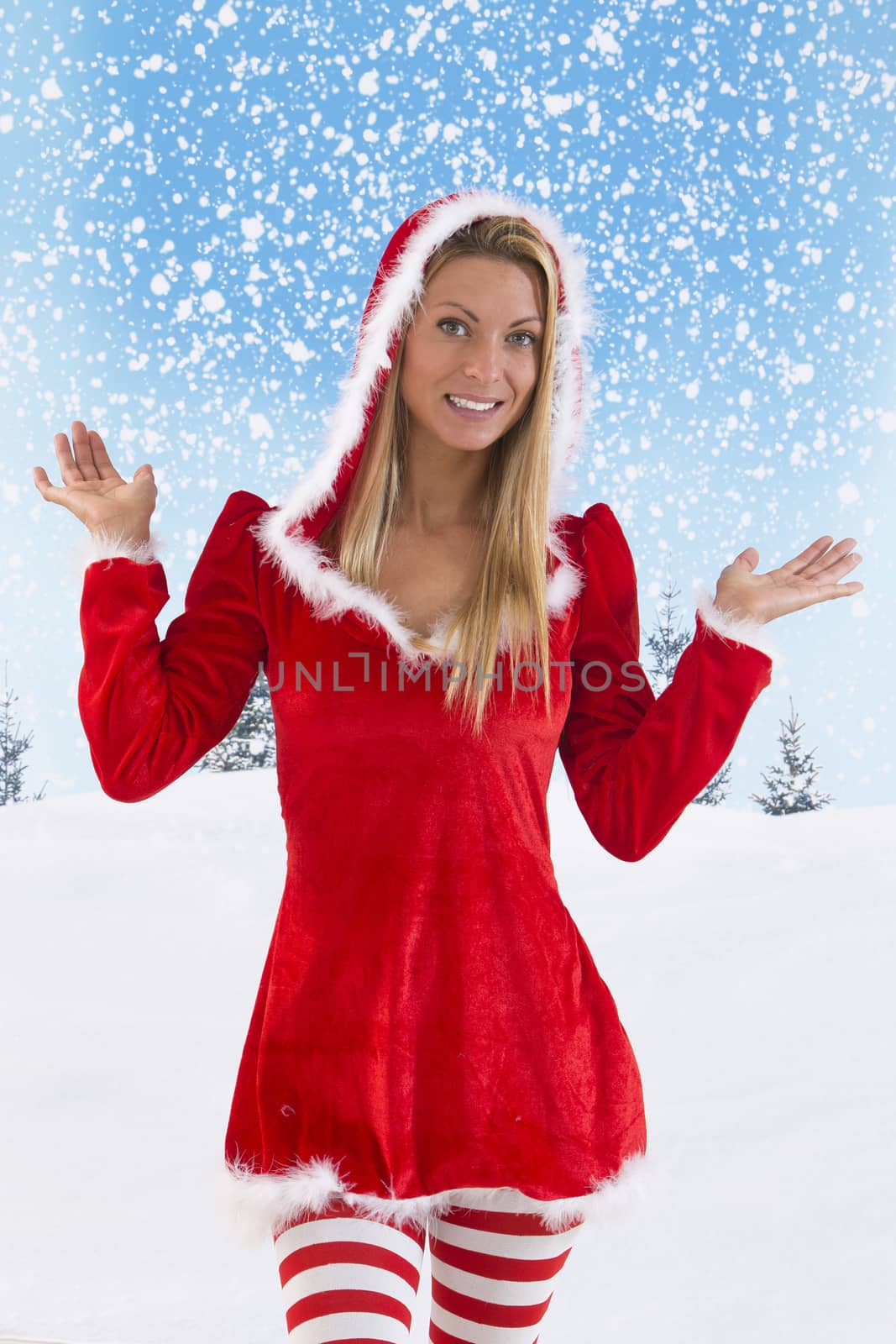 portrait of female Santa Claus posing on snowing background by JPC-PROD