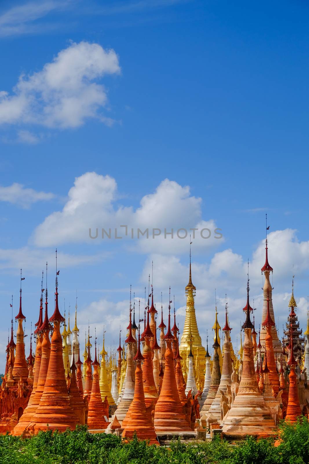 Scenic view of colorufl pagodas in Indein village, Inle lake by martinm303