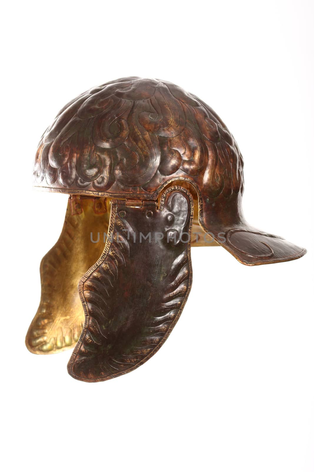 ancient bronze roman helmet over white