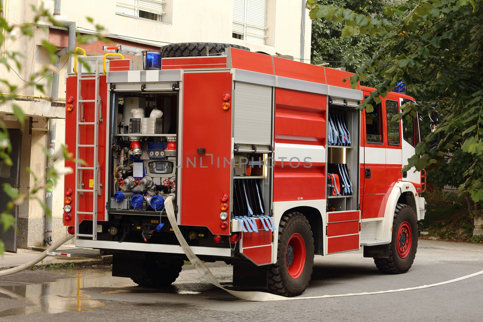 Big red fire truck in action