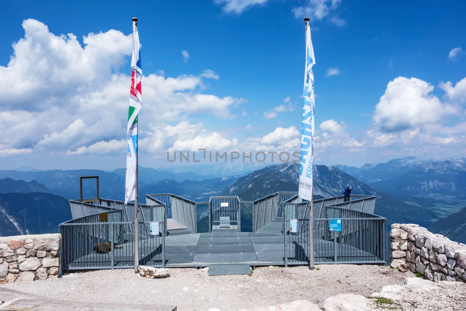 Obertraun, Austria - June 27, 2014: Viewing platform - view of mountains over the railing from the "five fingers" observation deck, Obertraun, Austria