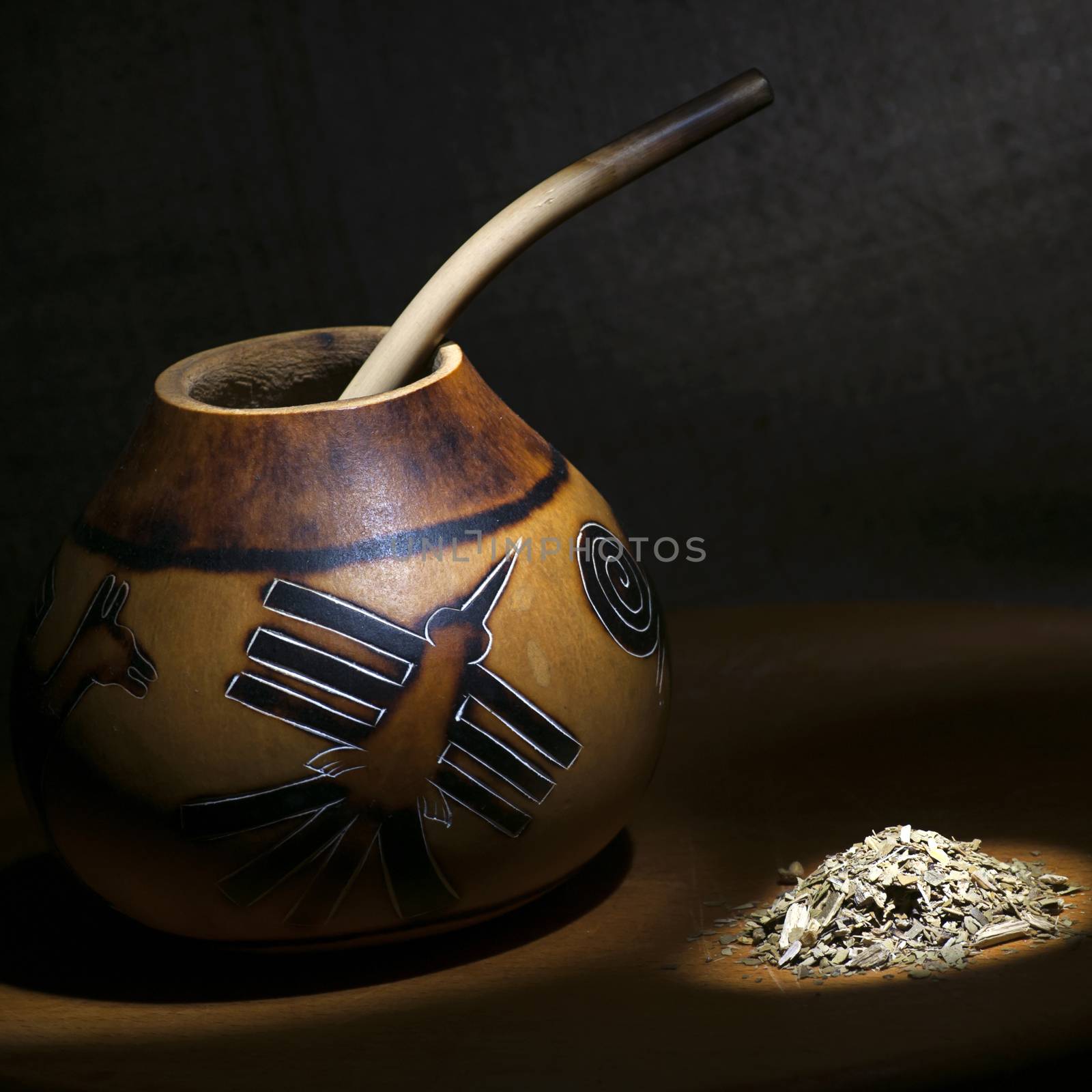 Traditional calabash gourd and yerba mate still life light brush technique