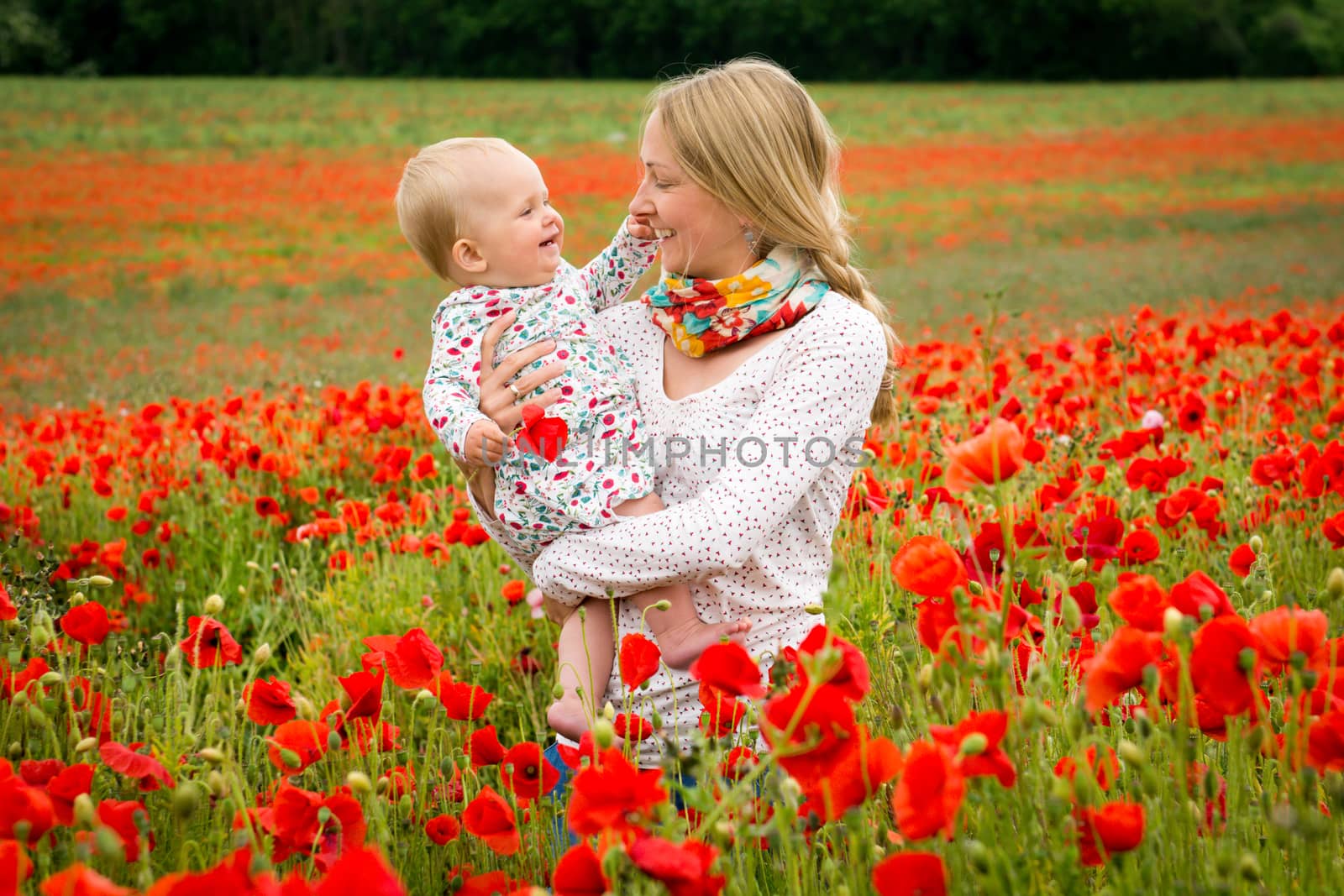 Mommy and daughter in a meadow by kamsta