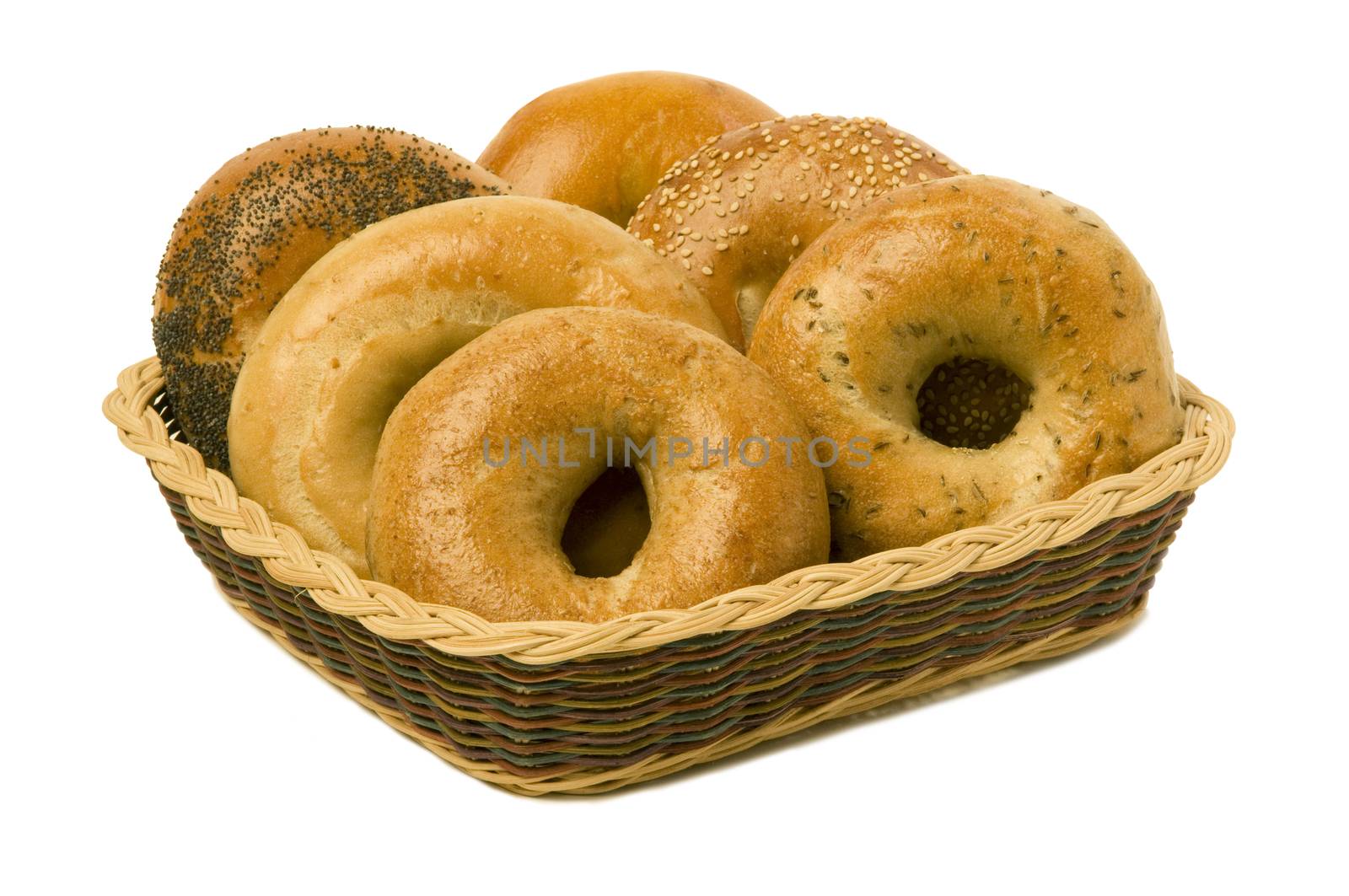 A variety of six bagels in a basket, isolated against white background