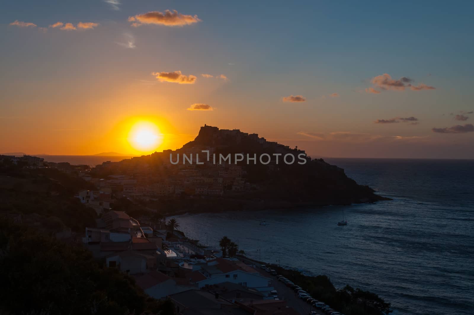 a view of Castelsardo , Sardinia, with the light of sunset