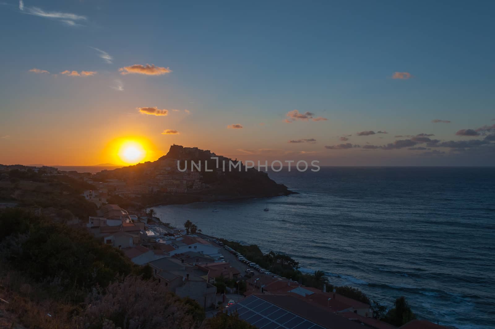 a view of Castelsardo , Sardinia, with the light of sunset