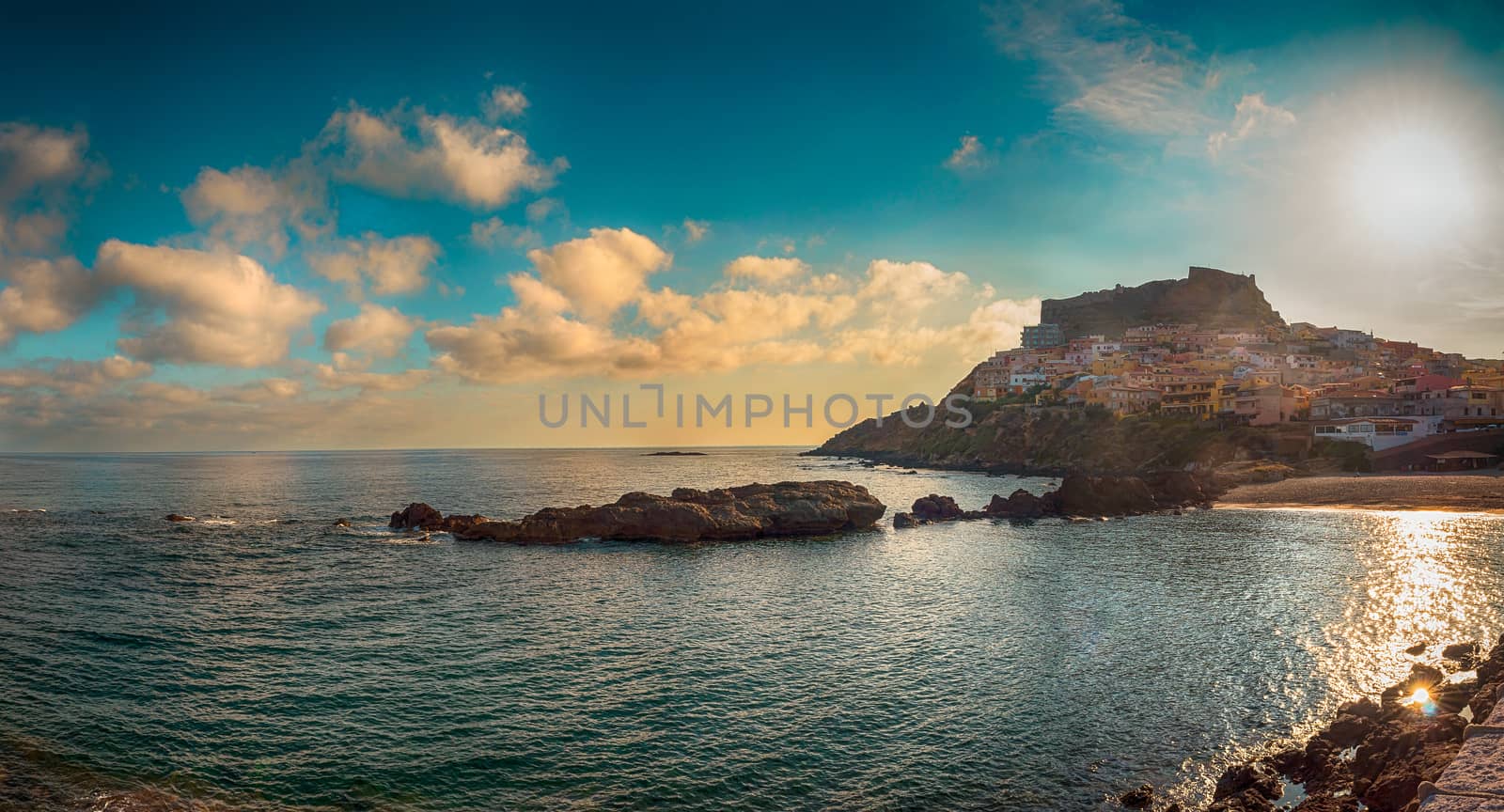 beach near the city of castelsardo in a sunny day