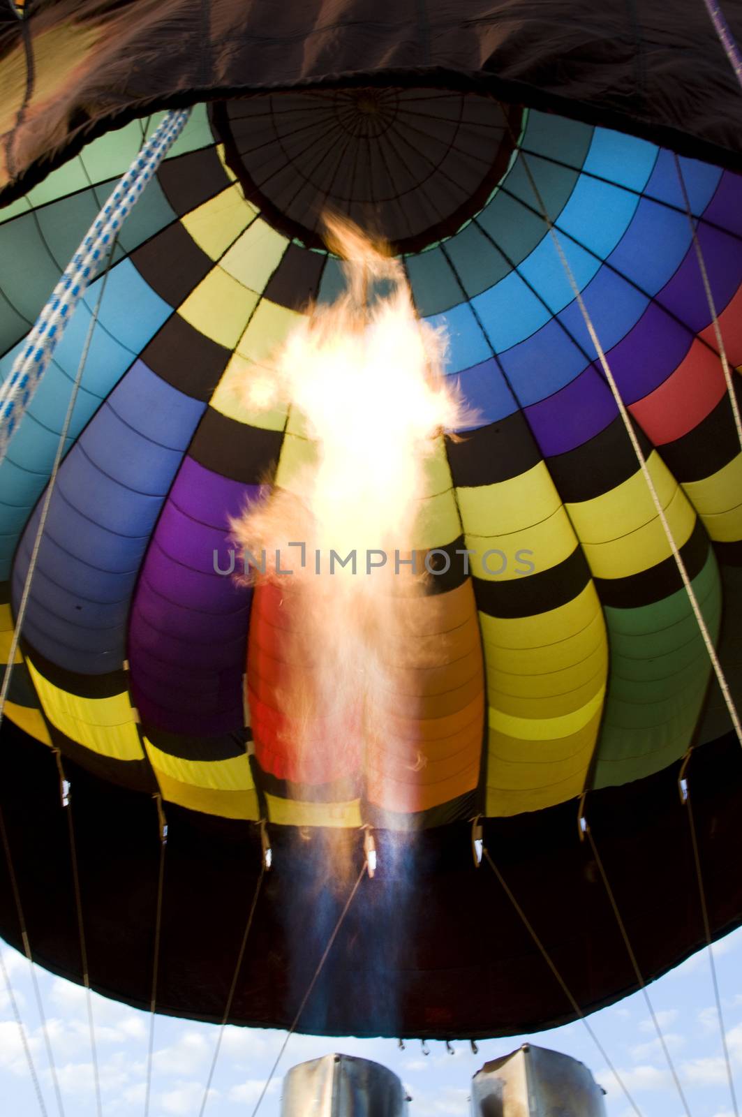 Flames from a burner inside a hot-air balloon envelop. This is how a balloon acheives lift