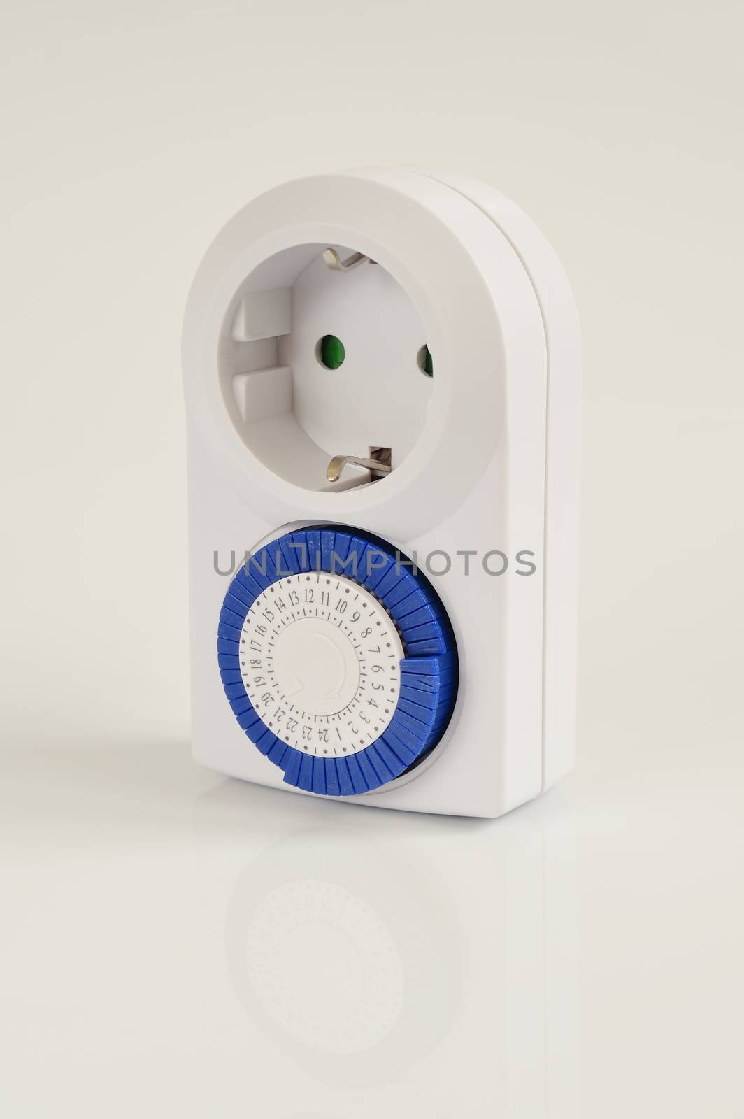 White electric timer on isolated background.