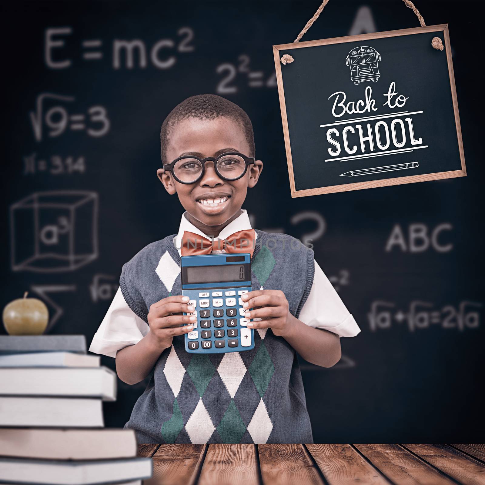 Composite image of happy pupil with calculator  by Wavebreakmedia