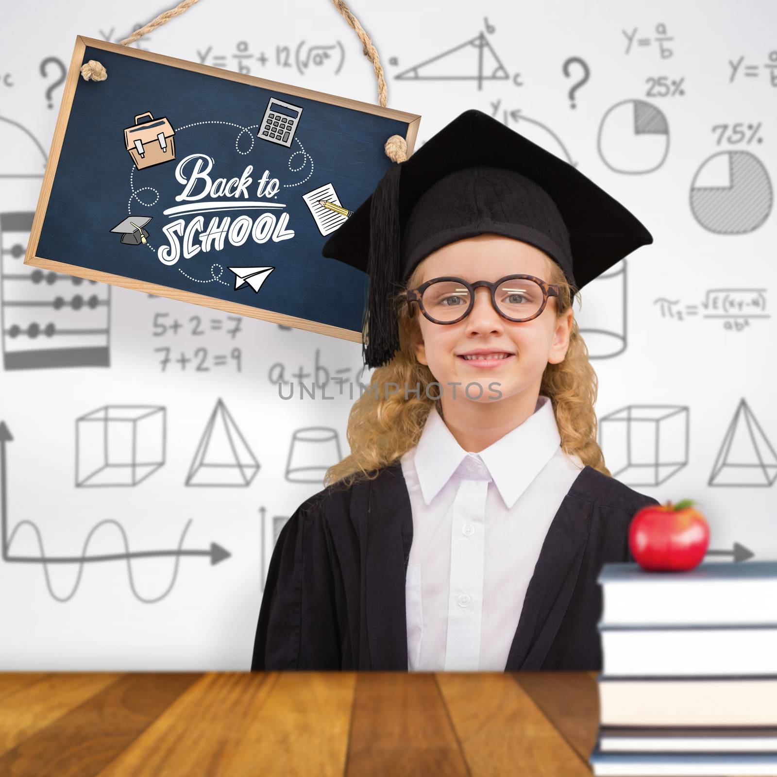 Composite image of cute pupil in graduation robe   by Wavebreakmedia