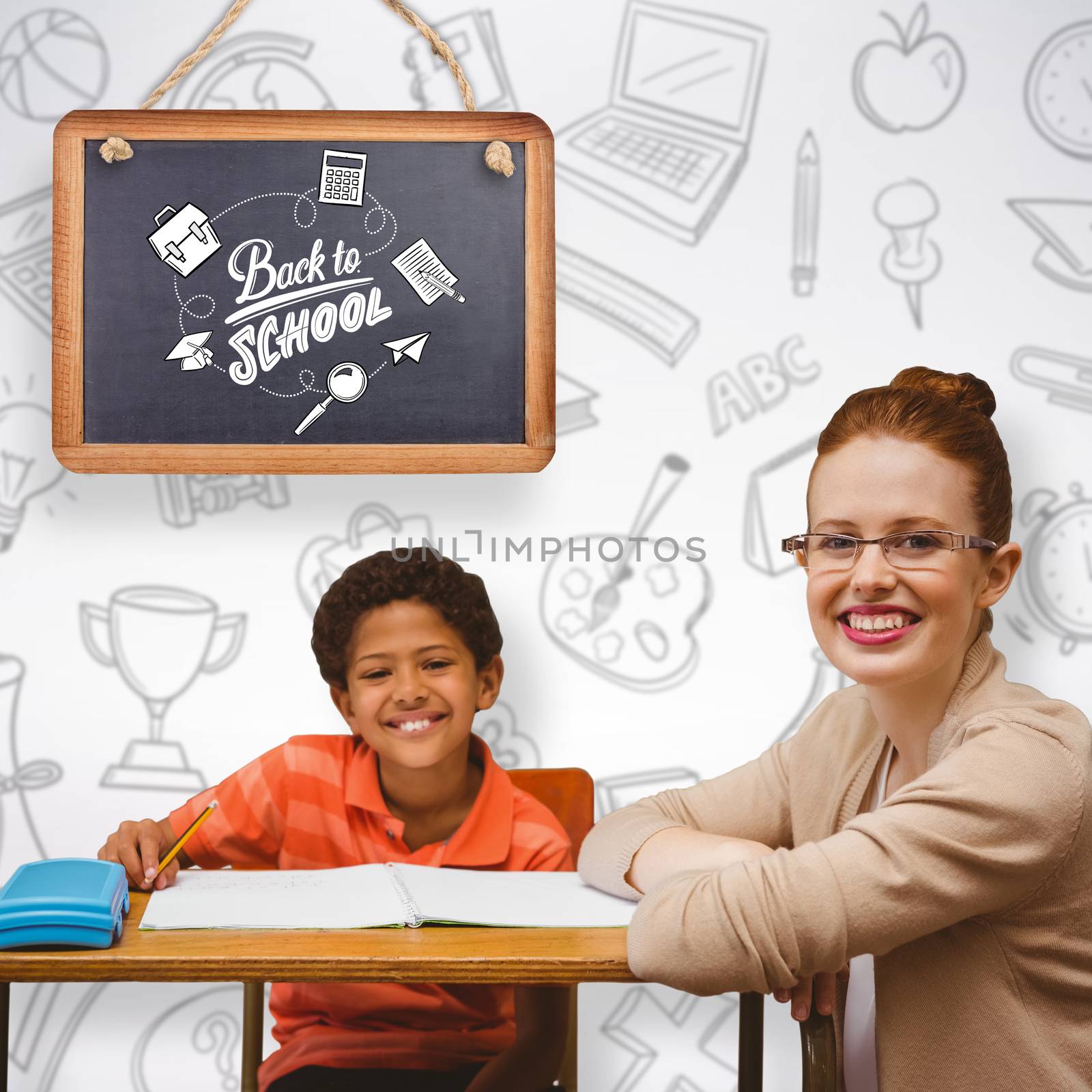 Teacher helping pupil against grey background