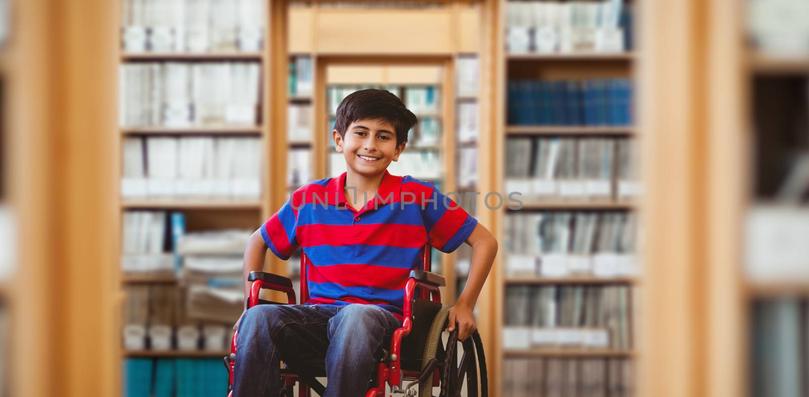 Composite image of boy sitting in wheelchair in school corridor by Wavebreakmedia