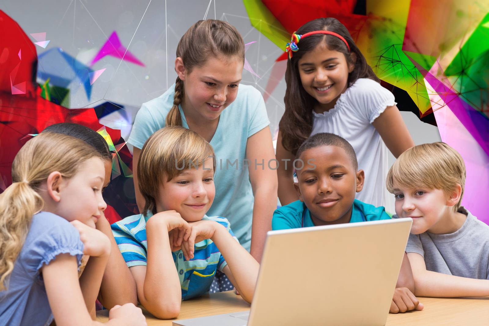 Cute pupils using tablet computer in library against angular design