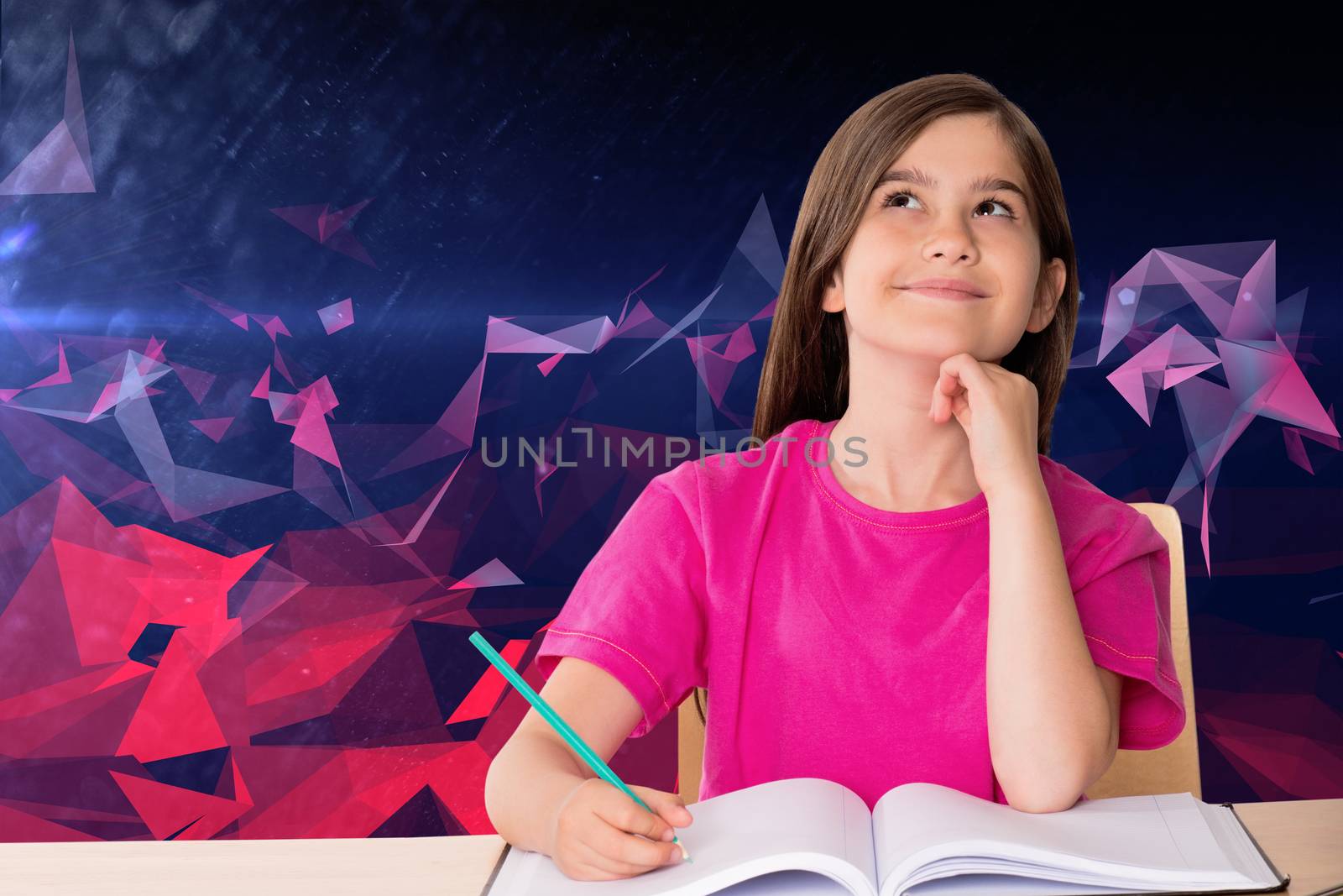 Composite image of cute pupil working at her desk by Wavebreakmedia