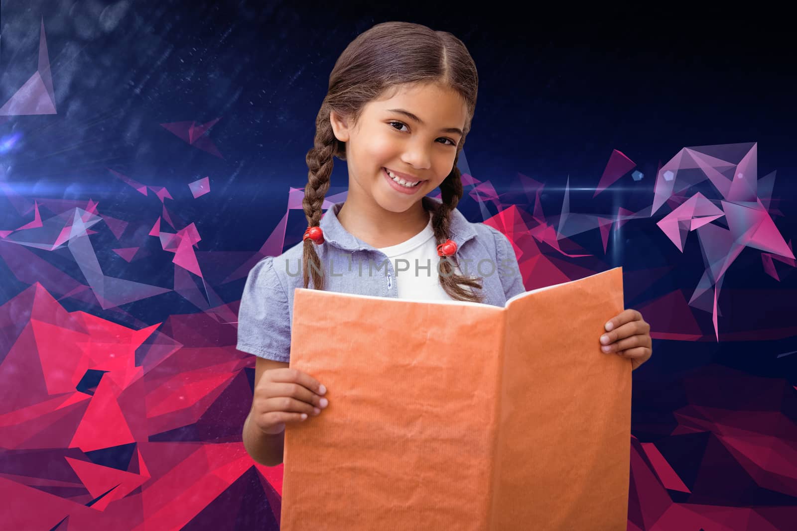 Cute pupil smiling at camera during class presentation against dark abstract design