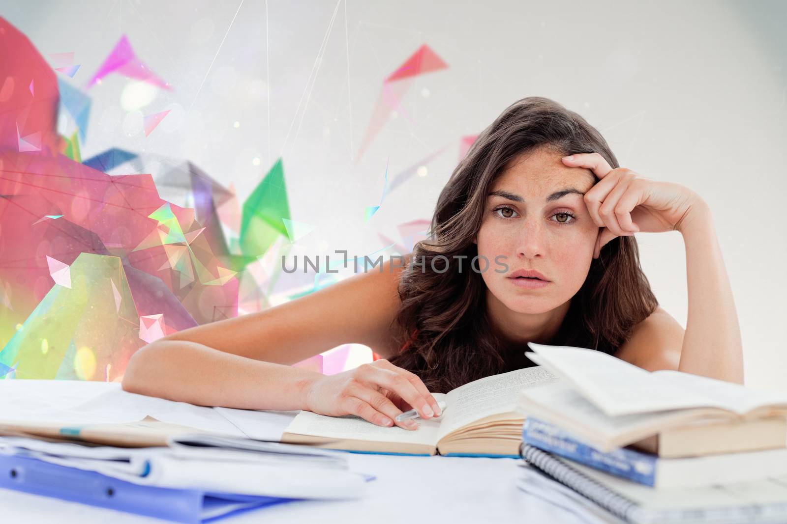 Composite image of bored student doing her homework by Wavebreakmedia