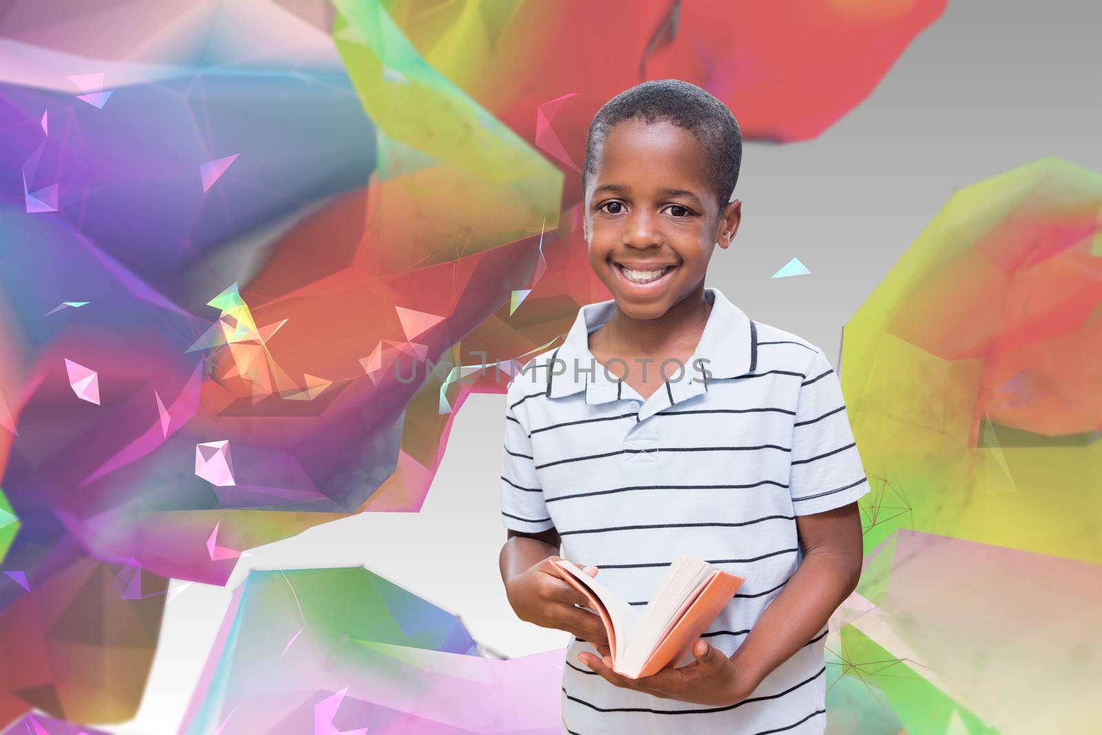 happy pupil with book against colourful abstract design