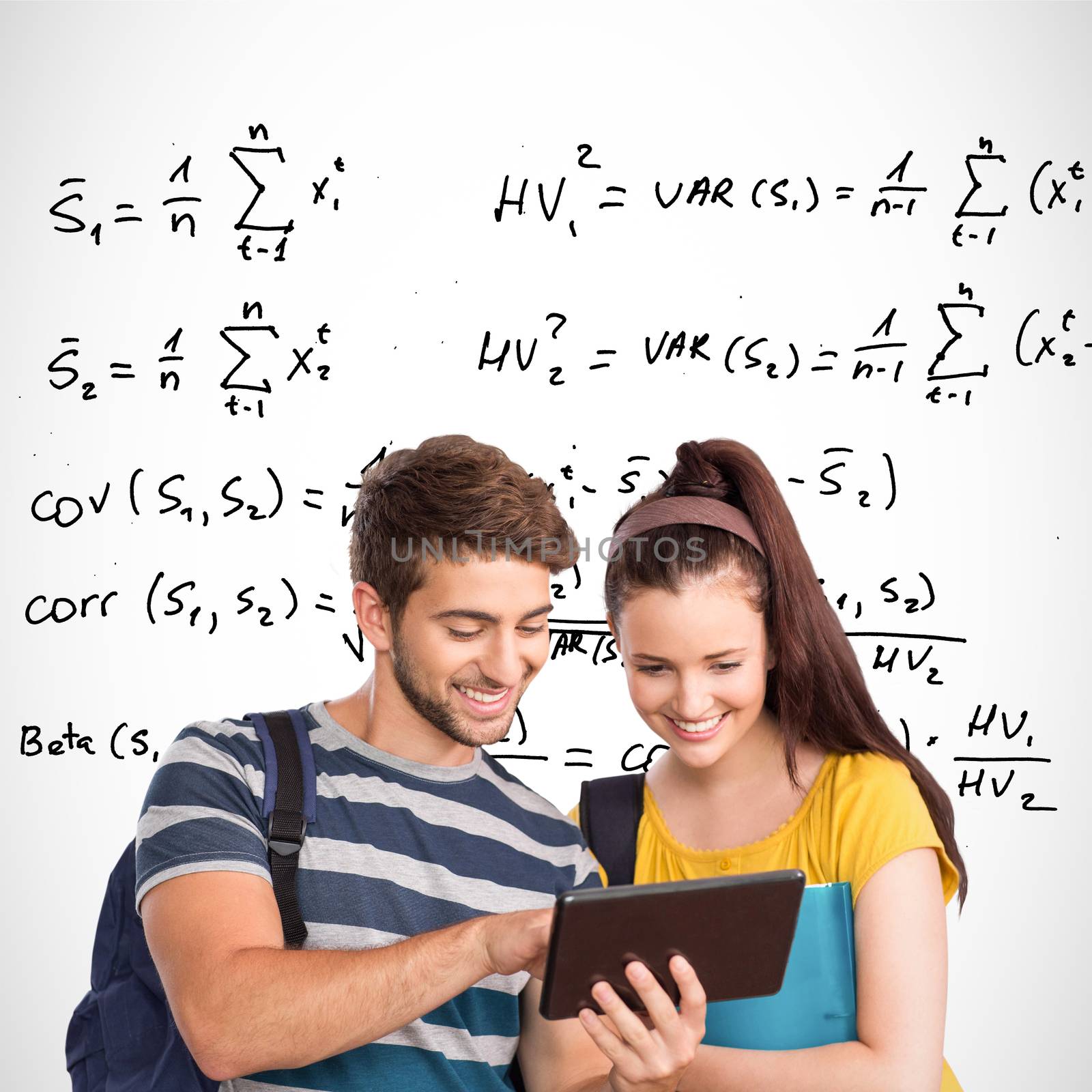 Happy students using tablet pc against maths equations