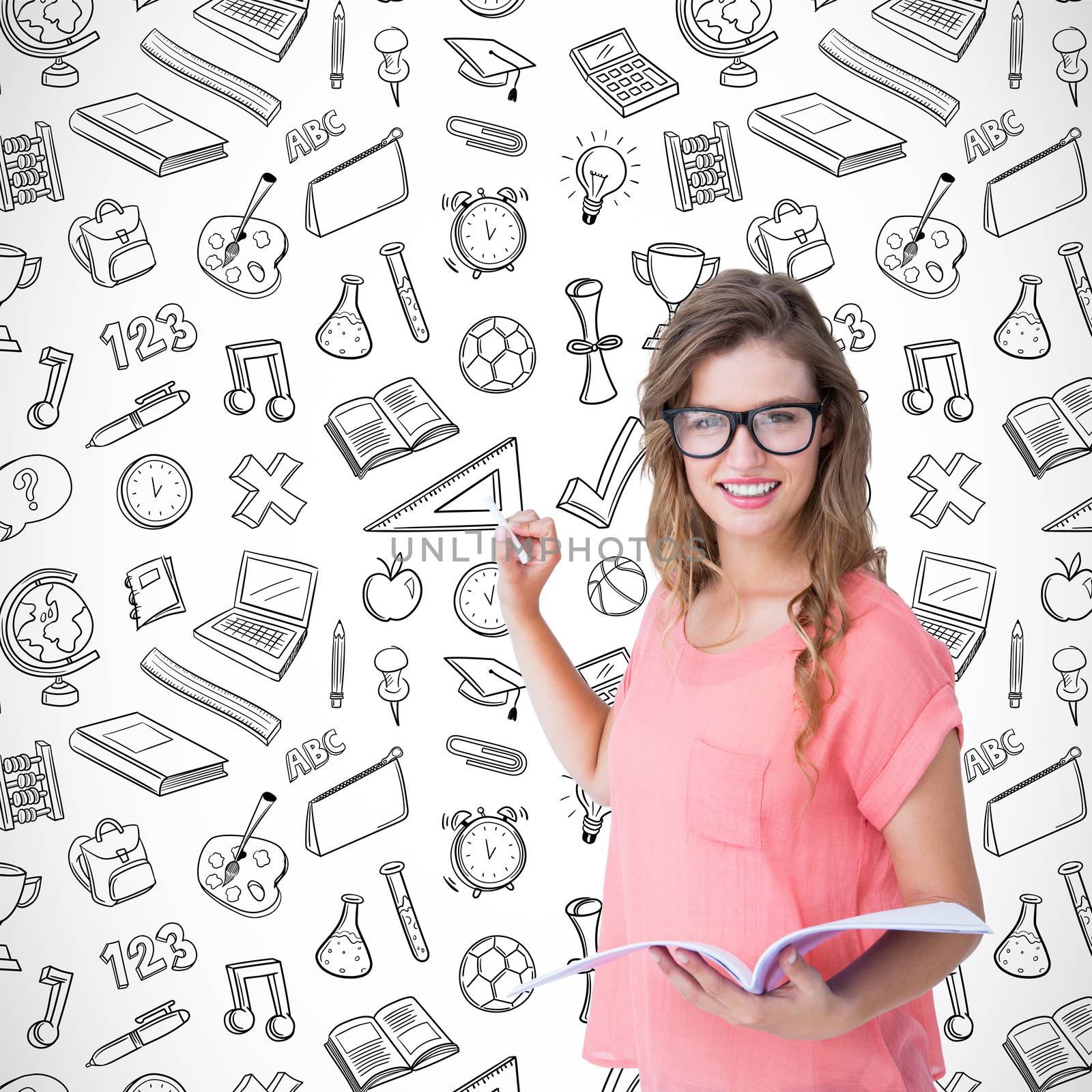 Hipster woman holding notebook  against school wallpaper