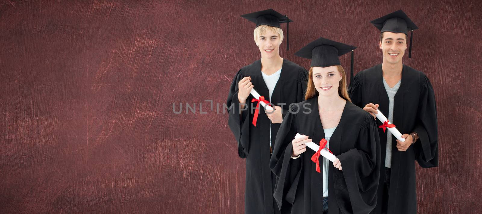 Group of teenagers celebrating after Graduation against desk