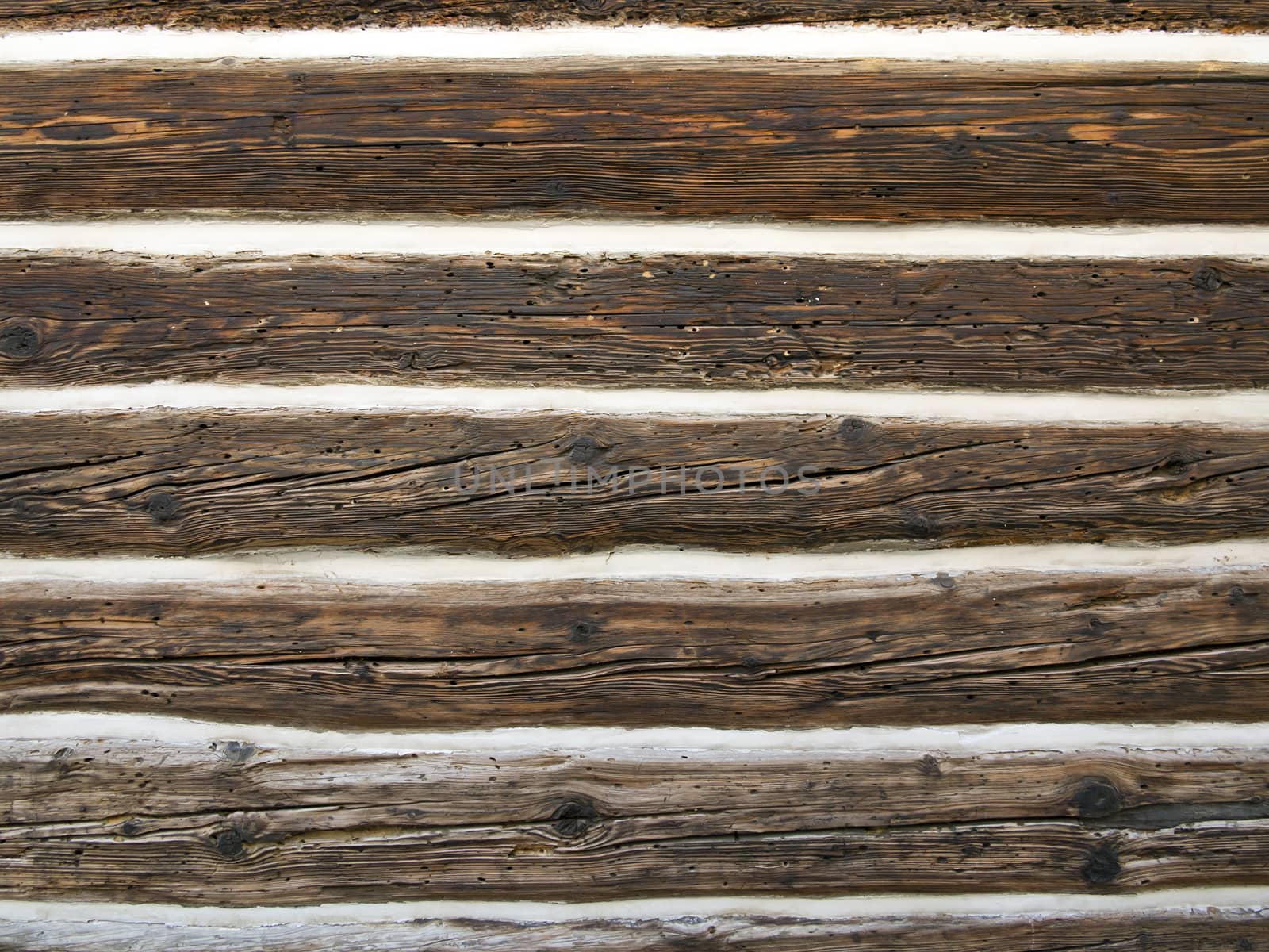 Detail of the wall of the timbered cottage - wood texture