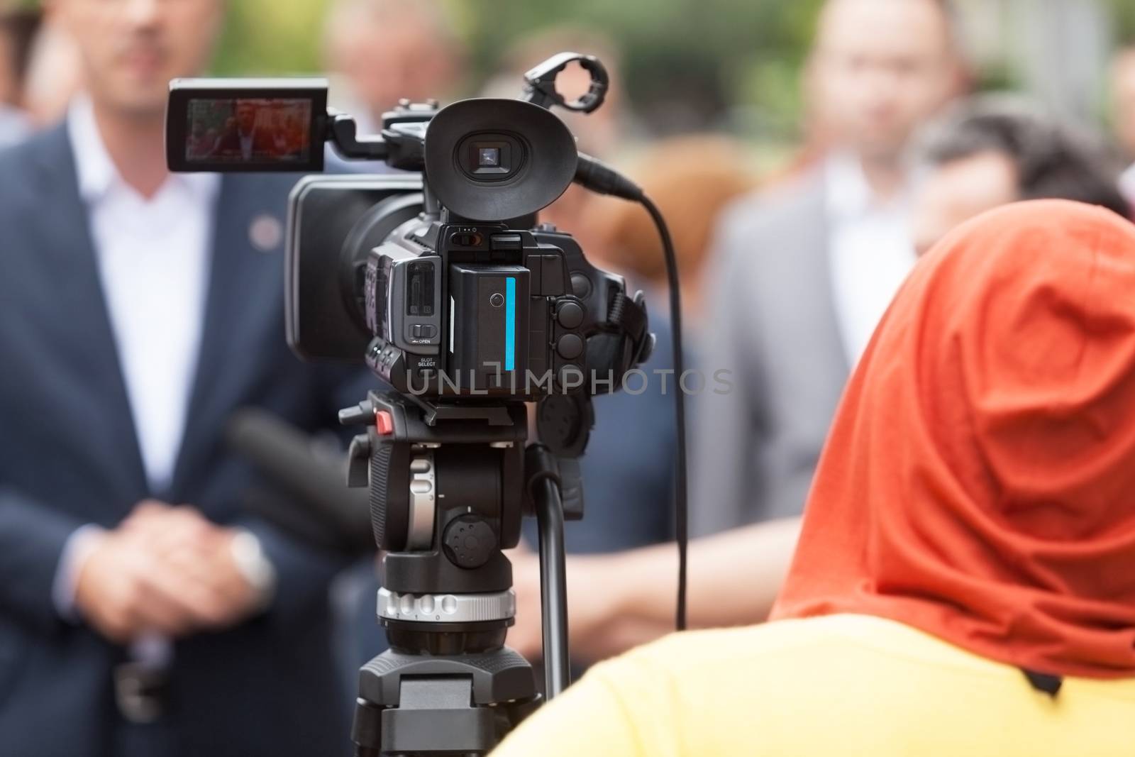 Filming an event with a video camera